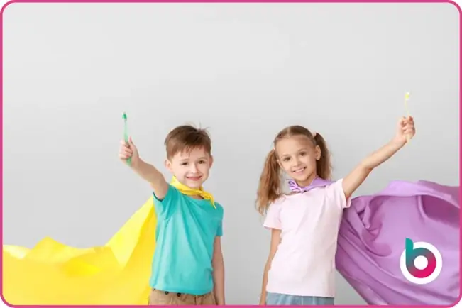 Best-start-image-children-with-toothbrushes-in-their-hands-and-capes-on