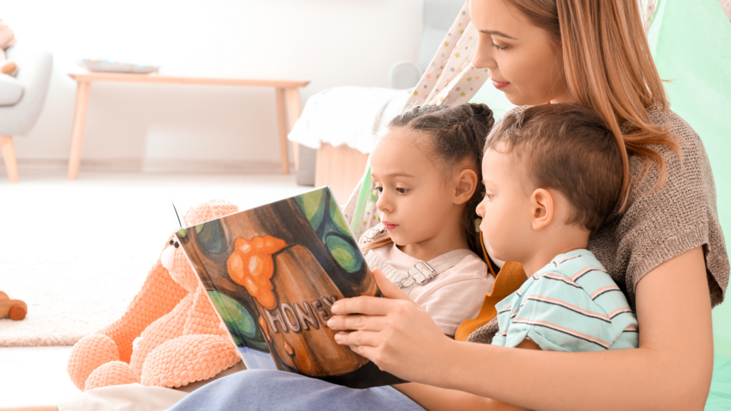teacher reading storybook to children