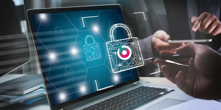 Computer screen with Blossom logo on