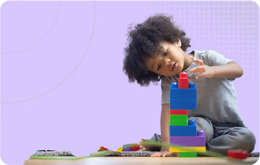 British values image - child playing with building blocks