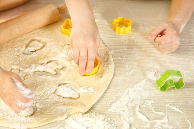 Child-hands-playing-with-flour-and-dough-Flour-Heat-Treatment-Image-1-header