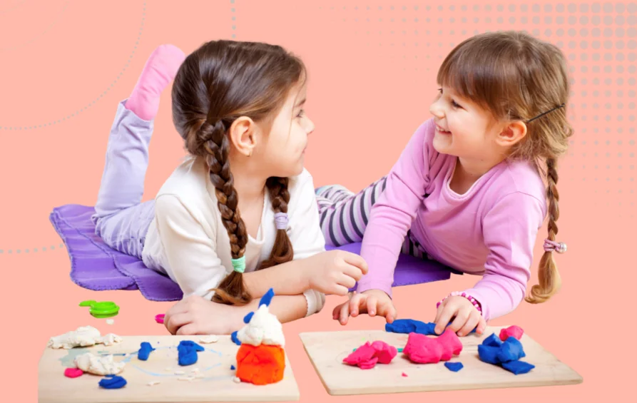 Inclusive Practice in early years image - two children playing with playdough
