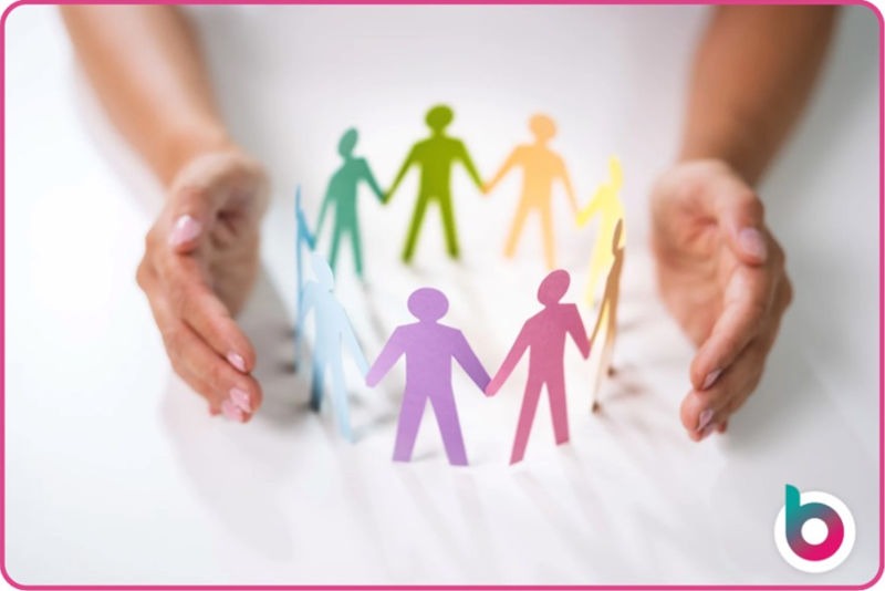 Nursery-workplace-culture-image-Childs-hands-around-people-cutouts