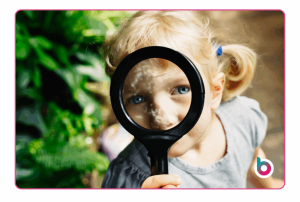 child-looking-through-magnifying-glass-1024x690-1-300x202