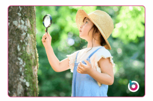 young-child-looking-at-magnifying-glass-1024x676-1-300x198