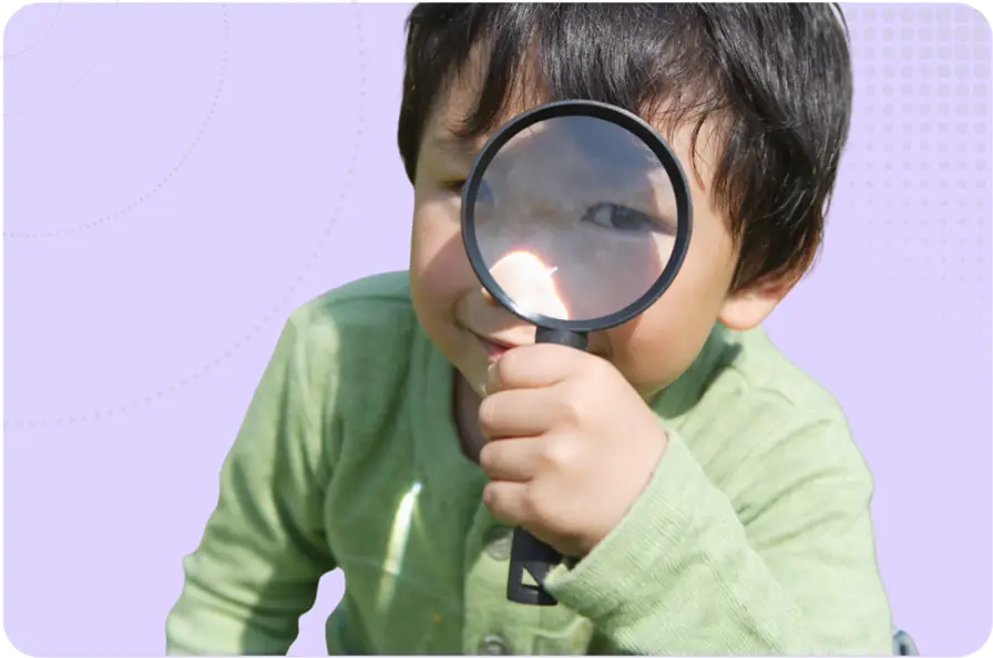 Ofsted Preparation call image - toddler with magnifying glass
