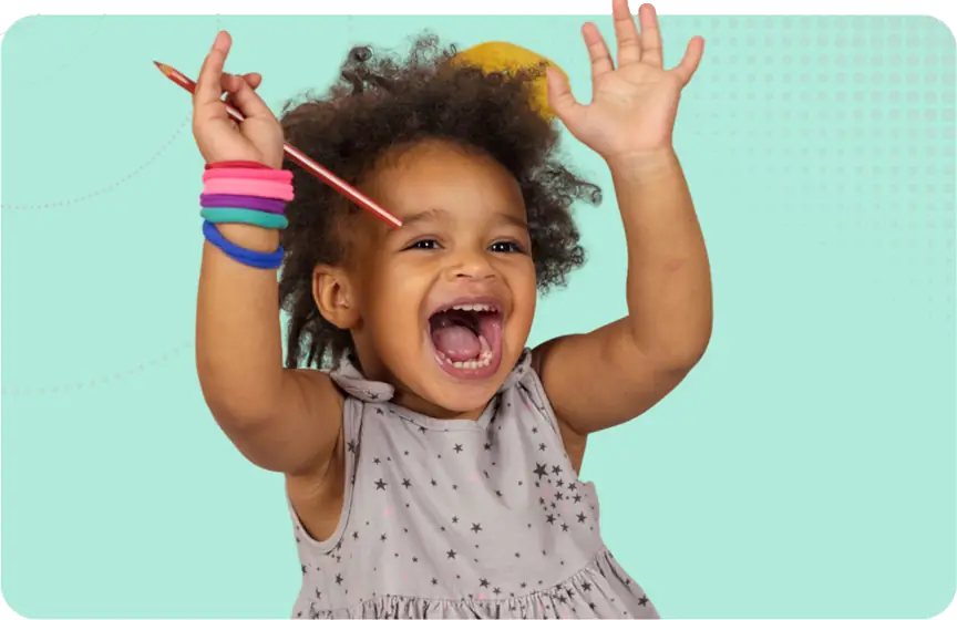 Ofsted Activities to expect image - a very happy child holding a pencil