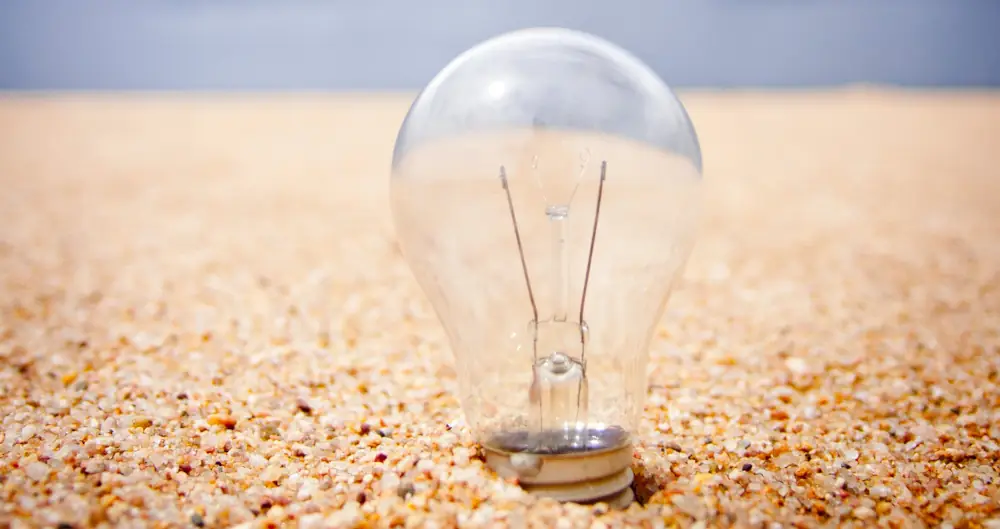 a lightbulb in the sand