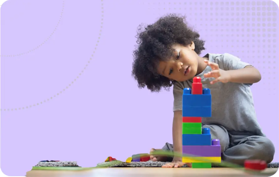 Mental Health for Children image - A child playing with stacking blocks