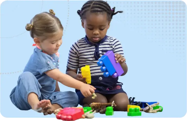 Mental Health for Children image - Children playing together with stacking blocks