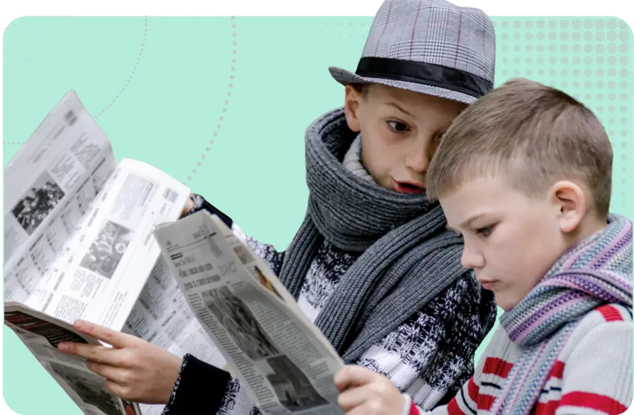 SEND Reform image - two children reading newspapers and discussing headlines