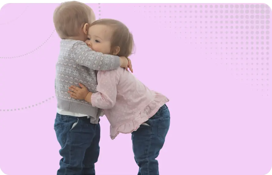 Nursery Staff Mental Health Image - Two toddlers hugging
