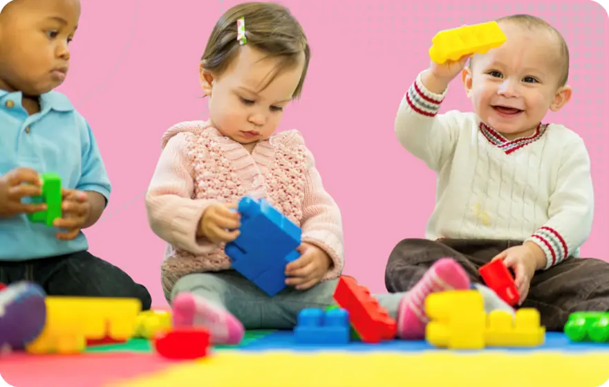 Safeguarding Children Image - 3 young children playing with blocks