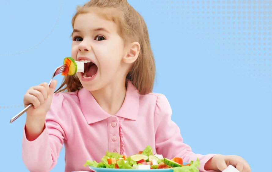 How Ofsted Inspects welfare and wellbeing image - A child putting a forkful of salad in her mouth