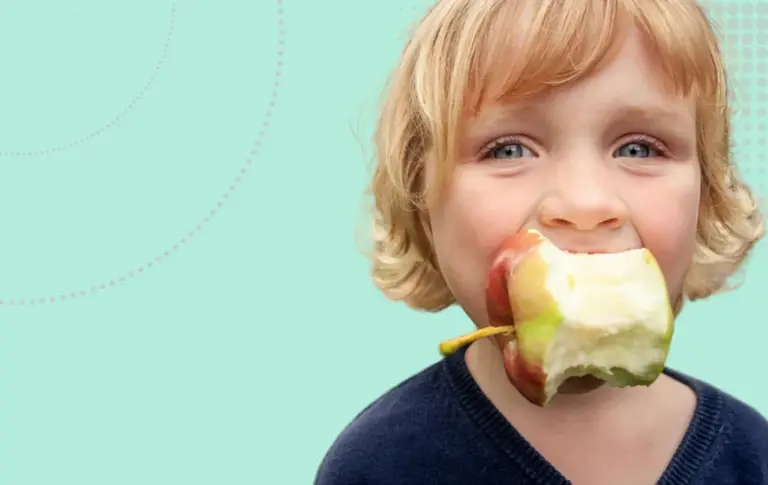 How Ofsted Inspects welfare and wellbeing image - A child scranning an apple