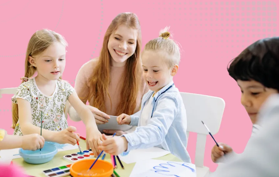 Nursery leadership and governance Image - A woman looks on as children paint