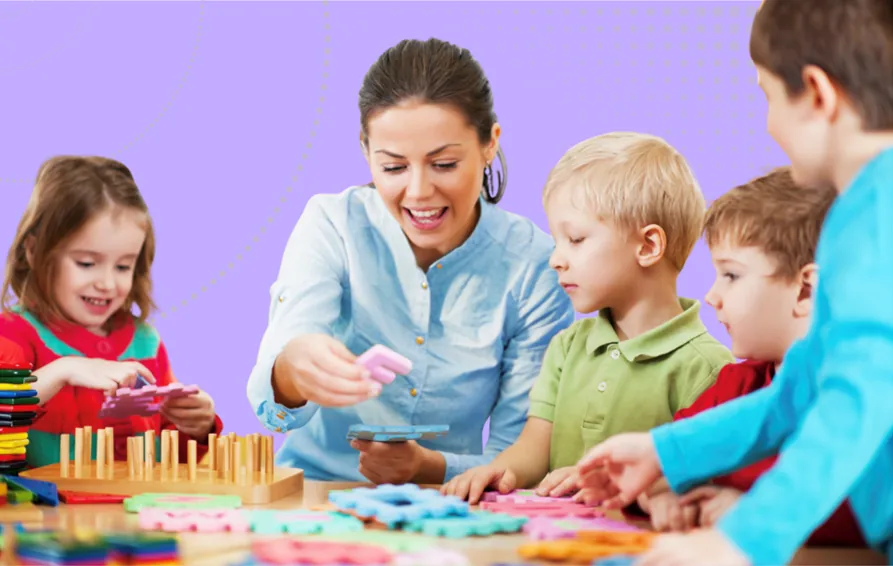 Nursery leadership and governance Image - A woman playing with interlocking pieces with several children around the table looking on