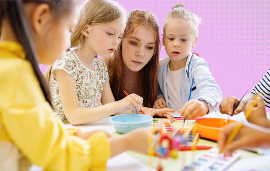 SEND in Early Years image - An adult helping children paint